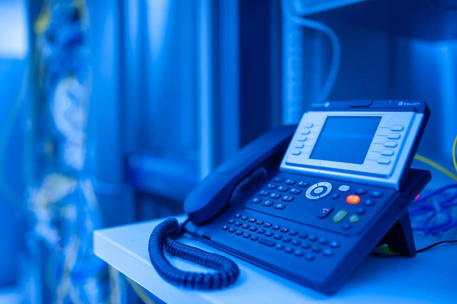 Smartphone showing an incoming call while resting on a bright clinic counter